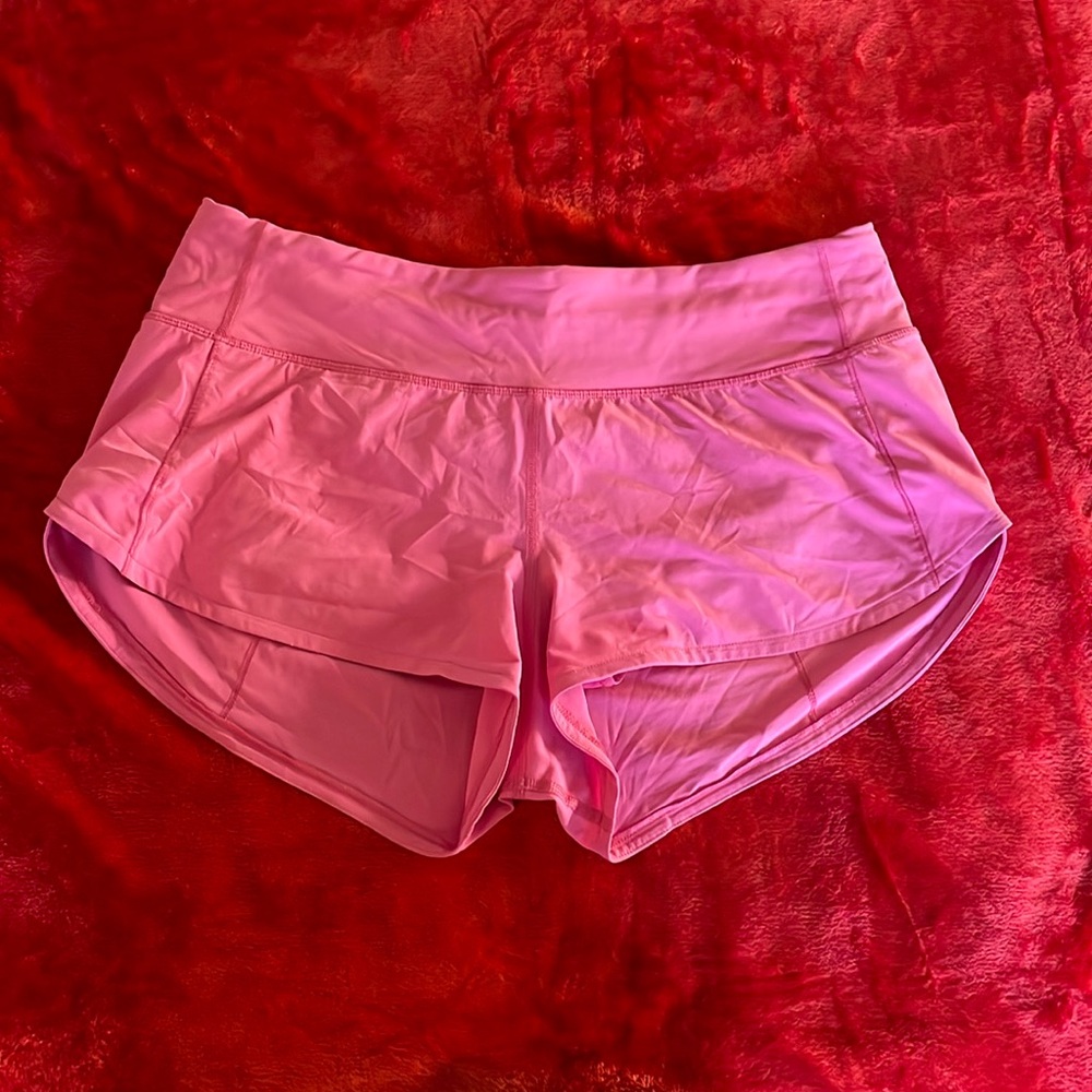 Size 6 pink lululemon shorts 2.5 
Barely worn perfect condition